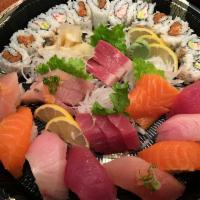 33. Sushi Boat Combo · 12 pieces of sashimi, 8 pieces of sushi, 6 pieces California roll, and a 6 pieces spicy tuna...