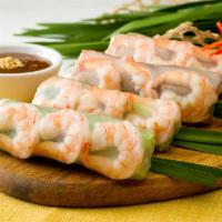 2. Spring Roll · 2 pieces. Shrimp, lettuce, chives, bean sprouts, vermicelli, carrot, served with peanut sauc...