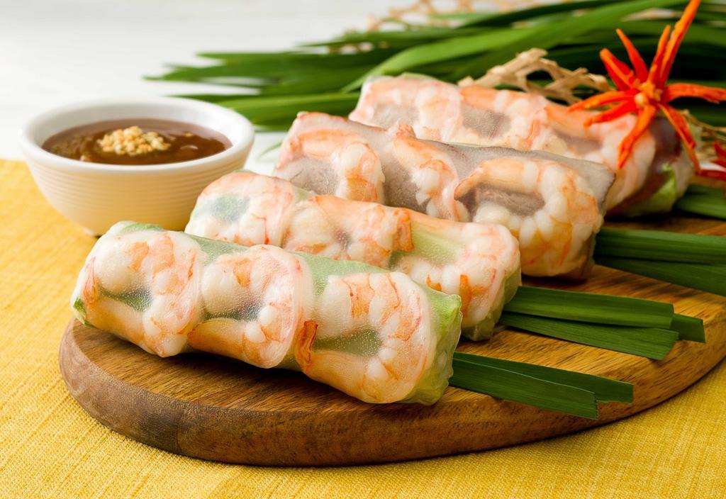 2. Spring Roll · 2 pieces. Shrimp, lettuce, chives, bean sprouts, vermicelli, carrot, served with peanut sauce. 