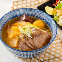 18. Hue Beef Noodle Soup · Bun bo hue. A spicy & richly flavored noodle soup, tender beef shank, tendon, meatball, cook...