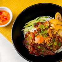 32. Grilled Pork & Egg Roll Vermicelli · Bun thit nuong cha gio. Grilled pork & crispy eggrolls on vermicelli with herbs, beansprout,...