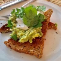 Avocado Toast · Avocado mashed with lemon juice, olive oil, salt, pepper. Served on toast. Topped with small...