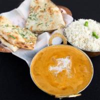41. Chicken Makhani · Premium chicken cooked in the tandoor and then baked in a butter sauce. Served with basmati ...