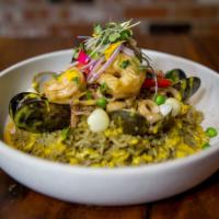 La chiclayana · Inspired from Chiclayo, a city in Northern Peru. Cilantro-Huacatay braised rice, mussels, cl...
