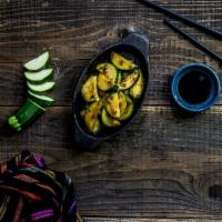 Chifa Vegetables · Stir fry Zucchini.
Contains: shellfish (Oyster sauce) & Soy