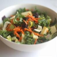 Kale Salad · Fresh kale, apples, shredded carrots, celery, almonds and cranberries in a house dressing.