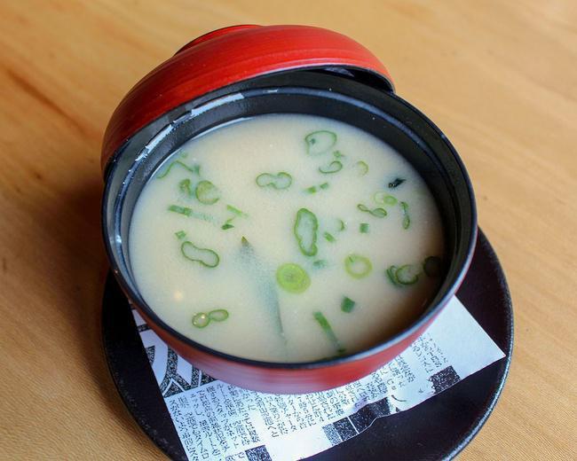 Miso Soup · Wakame seaweed, tofu, and green onion complete our miso and dashi broth-based soup