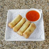 Spring Rolls · (4 pieces) Deep-fried egg rolls with vegetable filling.