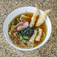 Udon · Thick noodles with vegetables and hard-boiled egg in a clear broth.