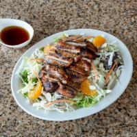 Asian Salad · Charbroiled chicken over romaine lettuce and carrots, mandarin oranges, almonds, crispy rice...