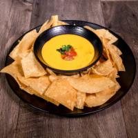 Chile con Queso · Add ground beef, chorizo, fajita meat for an additional charge.