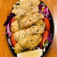 Reshami Kabob · Strips of white chicken meat prepared with special herbs and spices and cooked in our clay o...