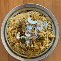 Lamb Biryani · Basmati rice cooked with pieces of lamb, spices.
