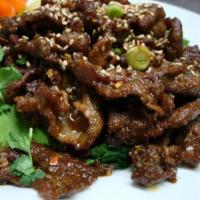 Sliced Lamb with Cumin Flavor · Hot and spicy.