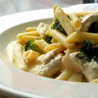 Penne di Casa · Penne tossed with sauteed broccoli and tender chicken medallions in a light cream sauce.