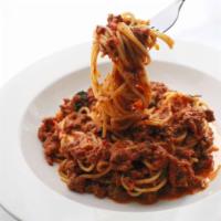 Spaghetti Bolognese · Spaghetti tossed in our homemade fresh tomato and meat sauce.