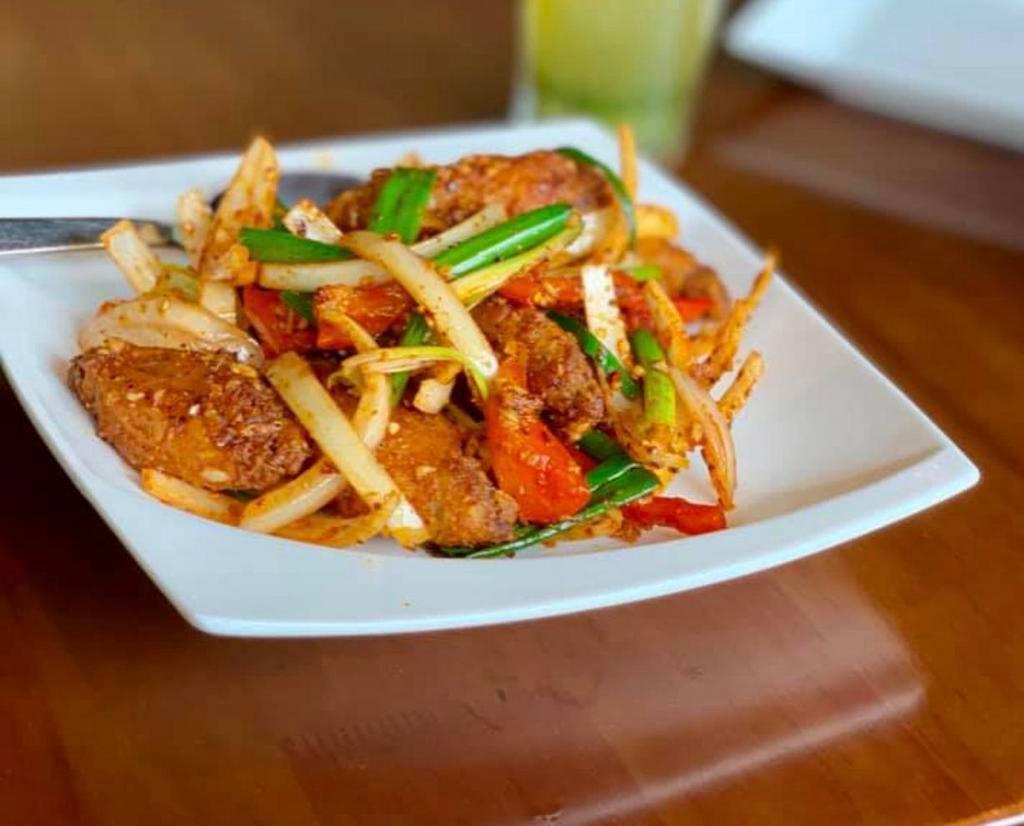 Burmese Chicken Wings · House special sauce with onions, green onions and bell peppers.