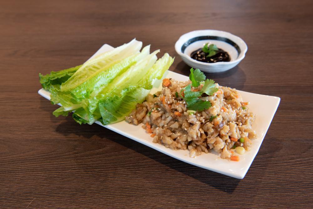 Lettuce Wrap · Sliced water chestnut, radish, green onions, mushrooms and carrots with side of lettuce and hoisin sauce.