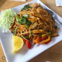 Spicy Noodles · Rice noodles with red bell peppers, mushrooms, bean sprouts, green onions, pea shoot, scramb...