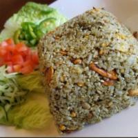 Tea Leaf Rice Salad · Fermented tea leaf paste mixed with jasmine rice, peanuts, sunflower seeds, sesame seeds and...