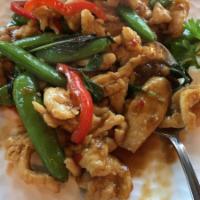 Lemongrass Chicken · Wok stir-fried with lemongrass snap peas, garlic, soy sauce, red bell peppers and finished w...