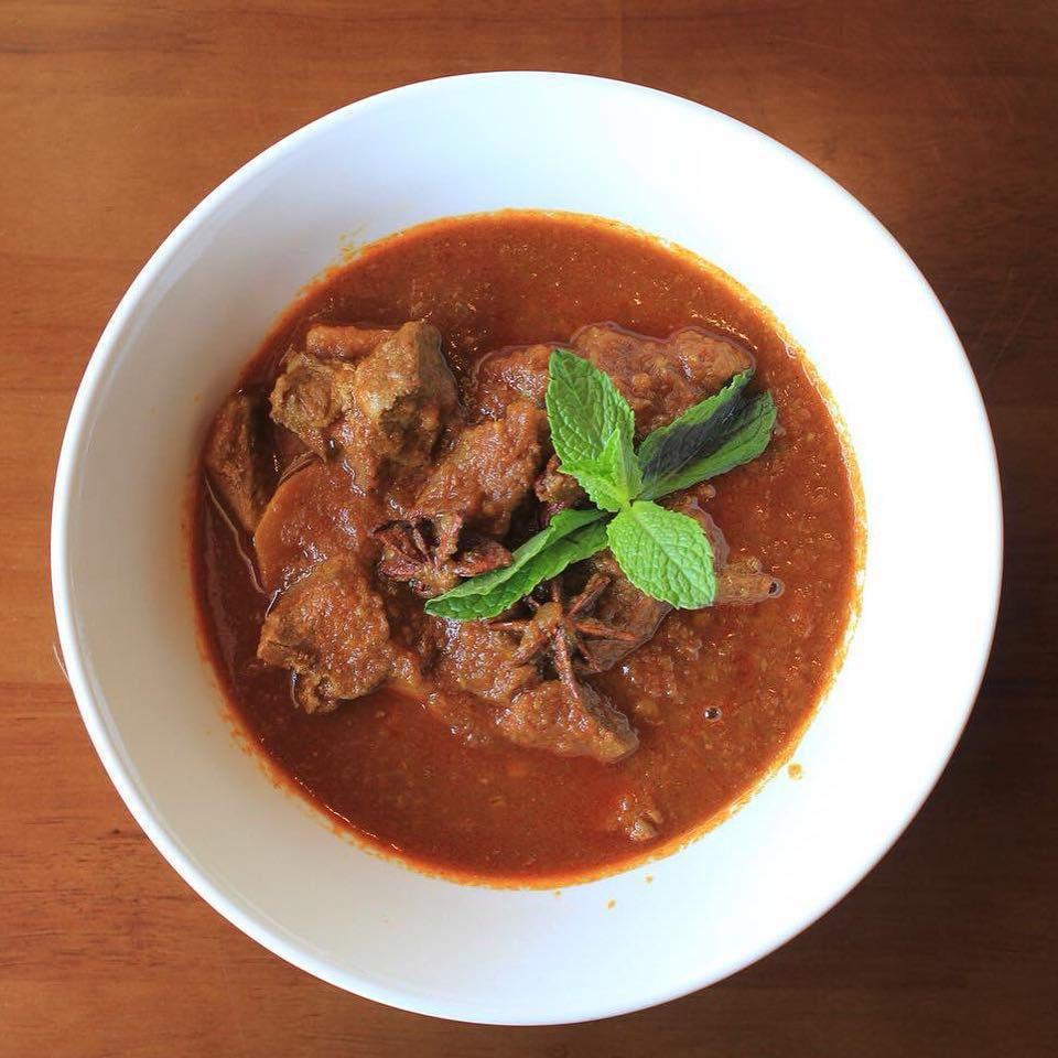 Traditional Red Curry with Pork · Red curry cooked with garlic, onions, ginger, lemongrass and red chili cooked in traditional style.