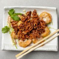Honey Walnut Shrimp · Thinly breaded shrimp tossed with lemon juice, condensed milk, mayonnaise and walnut.