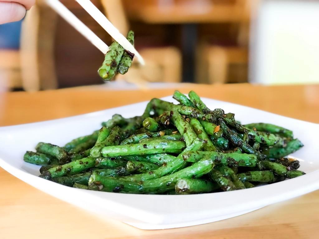 String Beans · Stir-fried string beans with garlic, ginger and chili with house sweet chili sauce.