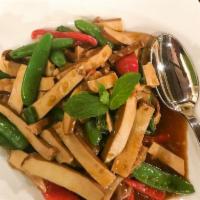 Lemongrass Tofu · Wok stir-fried with lemongrass, snap peas, garlic, soy sauce, red bell peppers and finished ...