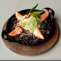 Sweet Sticky Rice · Black sticky rice mixed with coconut mikk and palm sugar with a scoop of ice cream