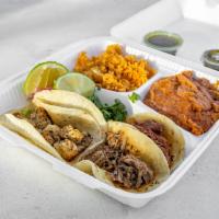 3 Taco Plate with Rice and Bean · Folded tortilla with a variety of fillings such as meat or beans. Meat options for tacos: sh...