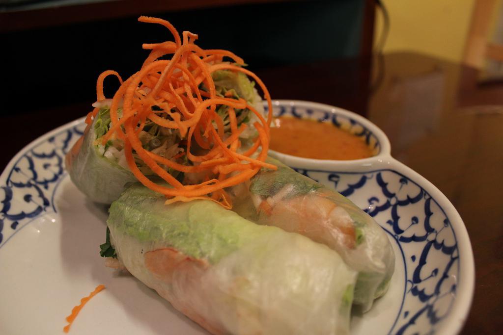 10. Fresh Rolls · Vegetarian. Gluten-free. Fresh salad rice paper rolls served with peanut sauce. Add protein for an additional charge.