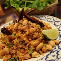 11. Kao Nam Tod · Spicy. Rice ball salad. Fried rice ball mixed with preserved pork and peanuts served with mi...