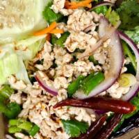 18. Larb · Gluten-free. Choice of spice level. Choice of ground chicken or pork mixed with red onions, ...