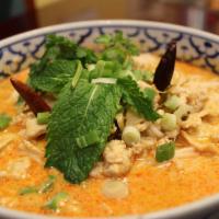 45. Kao Poon · Gluten-free. Choice of spice level. Special red coconut curry soup served with round rice no...