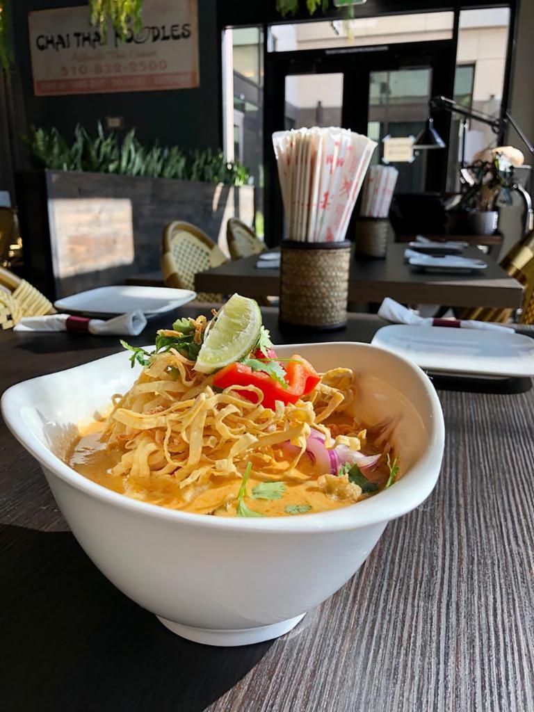 48.  Vegetarian Chaing Mai Noodles · Kao soy Thai. Egg noodles serve in light yellow curry soup with pickled mustard greens and red onions top with crispy egg noodles.
