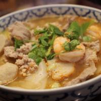56. Tom Yum Noodle Soup · Gluten-free. Choice of spice level. Hot and spicy noodle soup served with ground pork, slice...