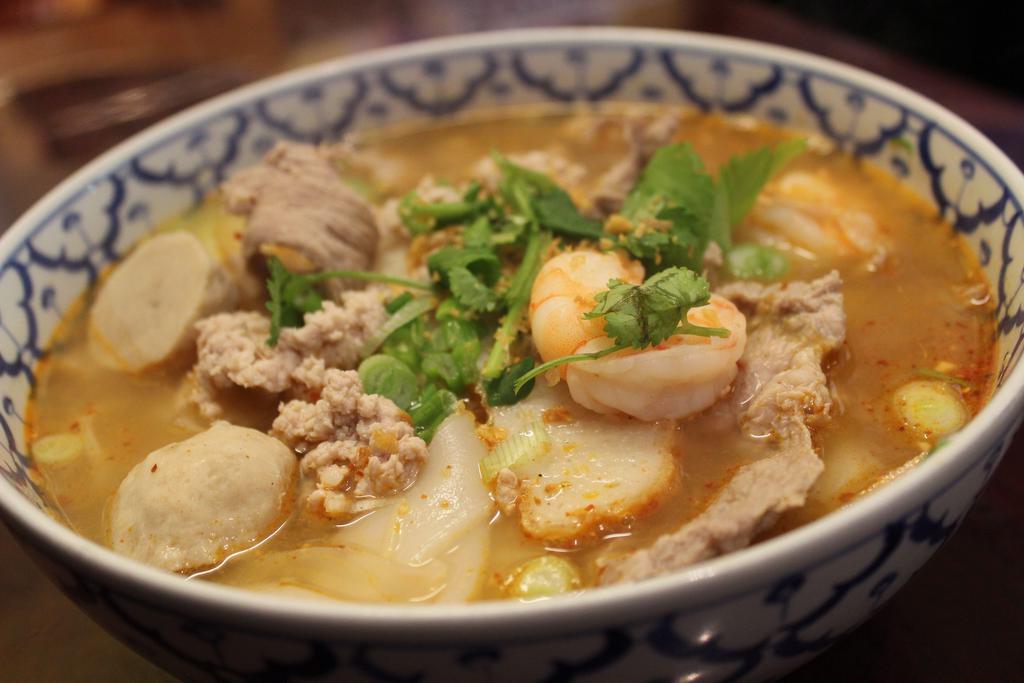 56. Tom Yum Noodle Soup · Gluten-free. Choice of spice level. Hot and spicy noodle soup served with ground pork, sliced pork, pork balls, shrimp, fish cake and ground peanuts.