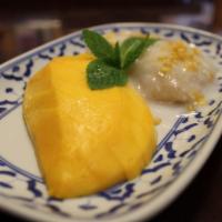 Sweet Sticky Rice with Mango · Sweet coconut sticky rice served with freshly sliced mango.