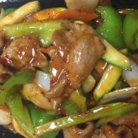 Garlic Pork · Pork, bell pepper, carrots, zucchini and celery in hot garlic sauce. Served with steamed ric...