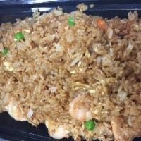 Shrimp Fried Rice · Stir-fried rice with onions, eggs, peas and carrots.