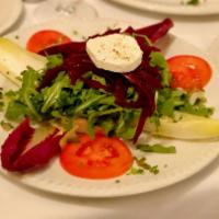 Endive, Arugula, Beets, Goat Cheese Salad · Served with citrus vinaigrette. 