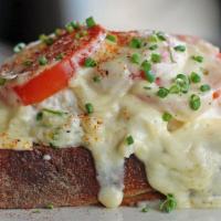 Open Faced Crab Melt · Sourdough, vine ripened tomatoes, white cheddar mornay, choice of beer battered fries or sid...