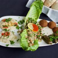 Veggie Platter · Hummus, baba ghanouge, grape leaves, falafel and tabouleh.