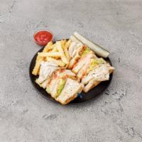 Fresh Turkey and Bacon Triple Decker Club · With lettuce, tomato, mayonnaise. Served with french fries, coleslaw and pickle.