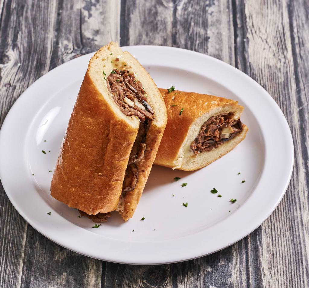 Classic Cheesesteak · Beef ribeye or chicken breast, grilled onion or mushroom, American or sweet provolone cheese.