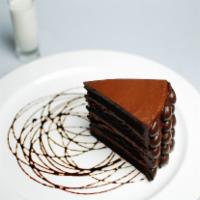 Death by Chocolate Cake · Sinfully decadent seven layer chocolate cake lavished with rich chocolate butter cream