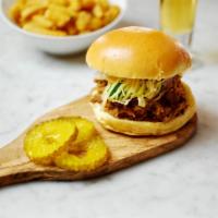 Thai Pulled Pork Sandwich  · An American favorite dressed in Thai! 
Slowly roasted for 8 hours, this tender and juicy pul...