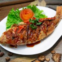 Tamarind Whole Fish · Crispy red snapper with our signature tamarind sauce. Spicy.