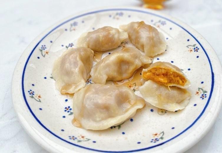Butternut Squash Pierogi · Filled with Butternut squash,  orange peel,  cinnamon, and ginger topped with maple syrup.  